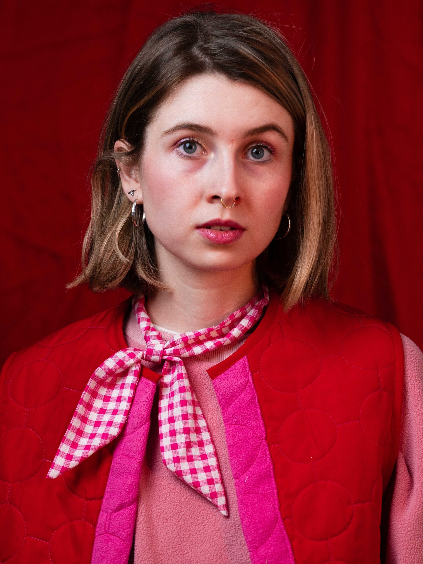 Rózsaszín kockás kendő