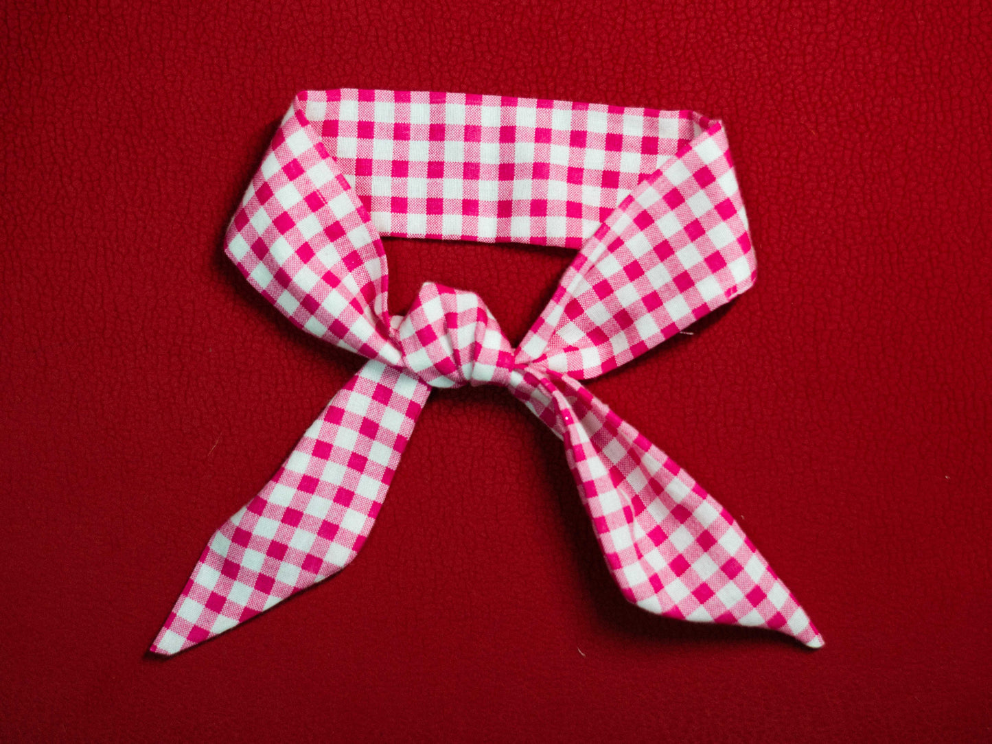 Rózsaszín kockás kendő