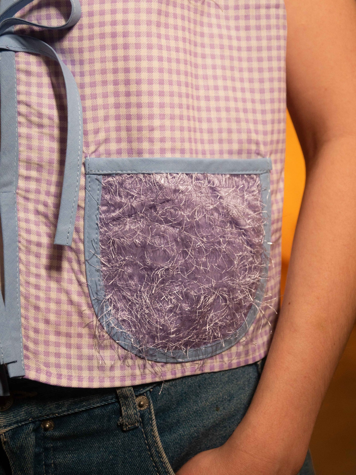 Fluffy Ibolya zsebes mellény