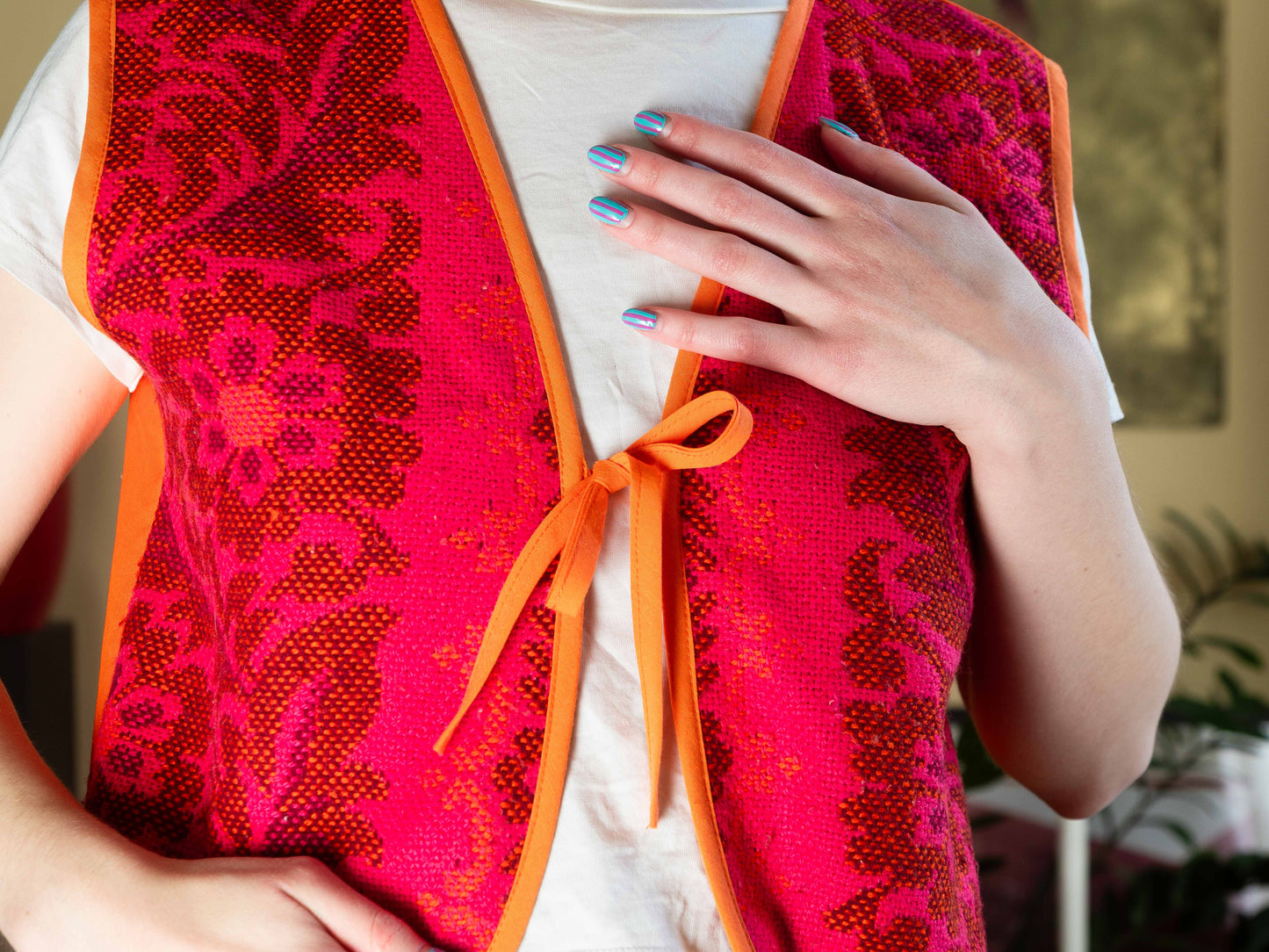 Narancs virágoskert mellény