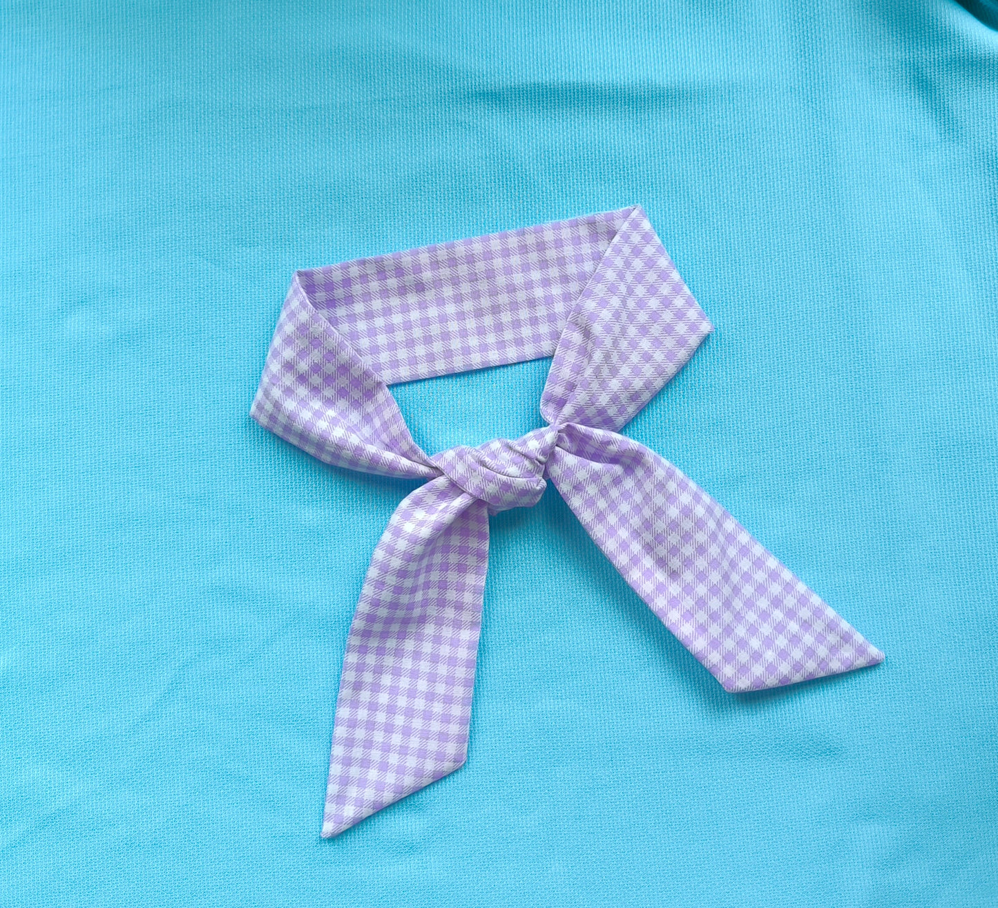 Lila kockás kendő